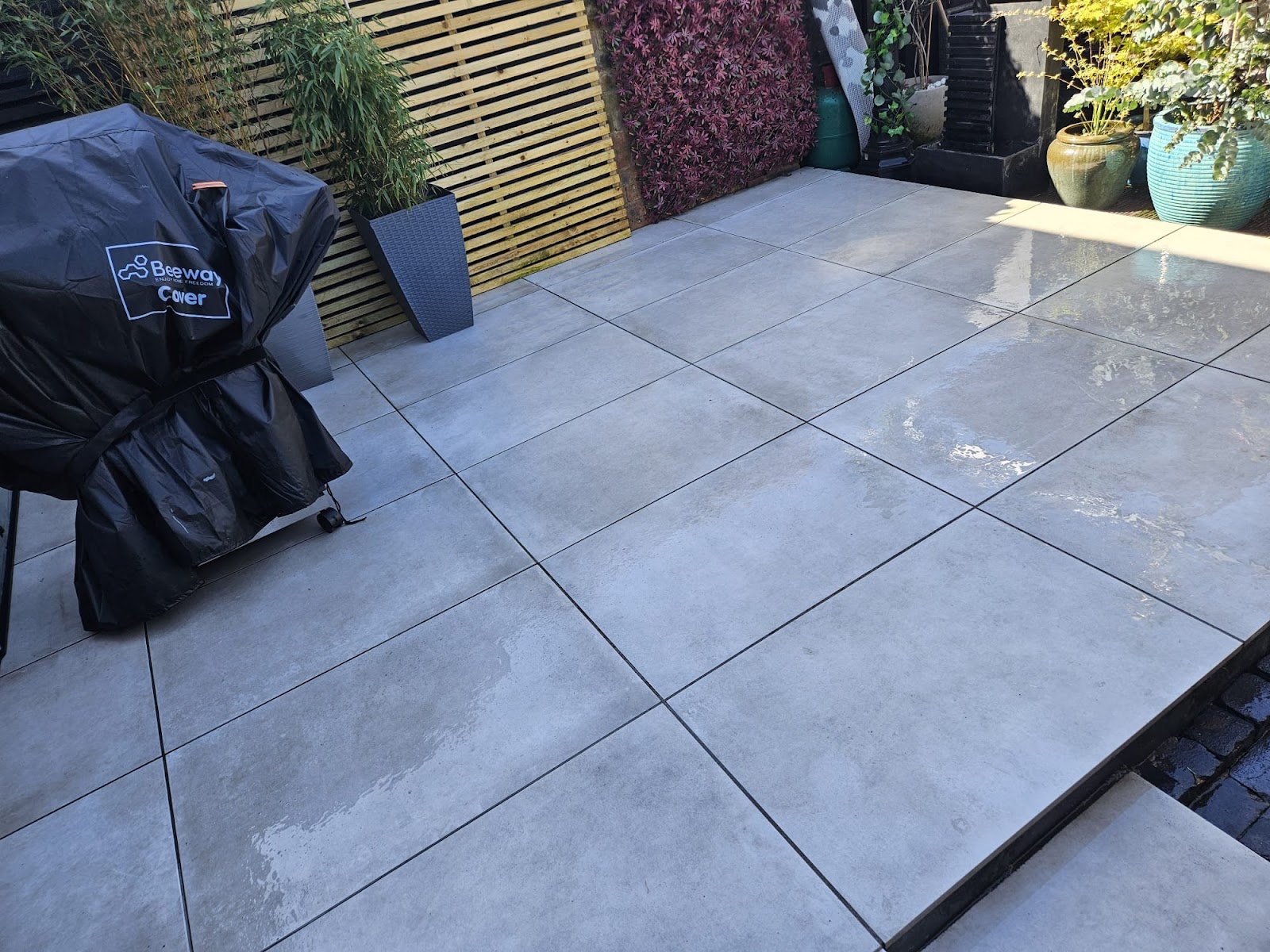 Tiled patio jet washed clean
