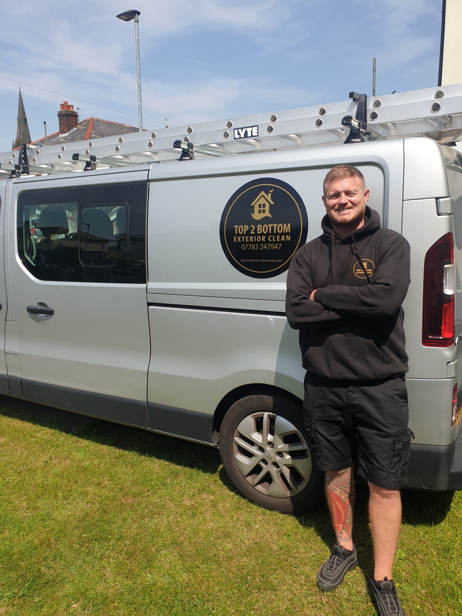 Paul from Top 2 Bottom Exterior Clean stood by the sign-written company van